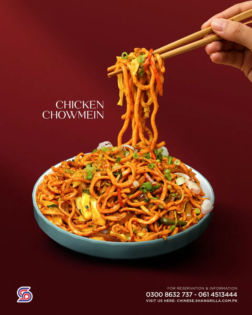 Chowmein lifted with chopsticks